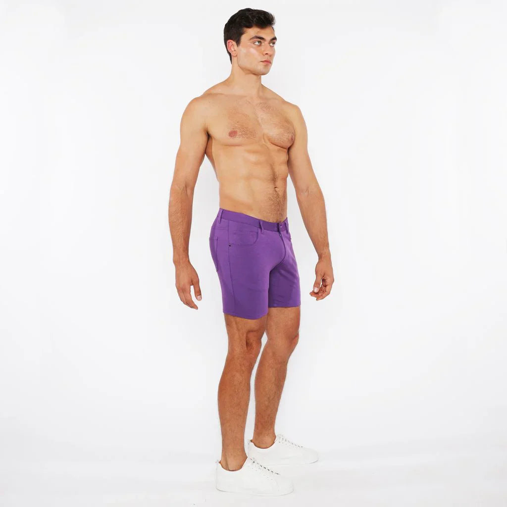 Purple stretch knit athletic shorts with tailored fit and subtle side pockets for comfortable active wear