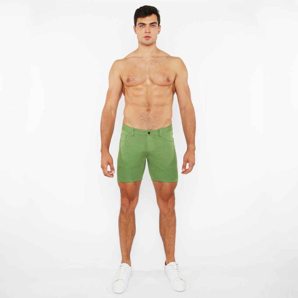 Green stretch knit shorts with a clean tailored fit and subtle stitching details