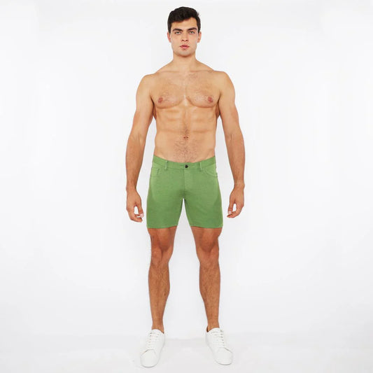 Green stretch knit shorts with a clean tailored fit and subtle stitching details