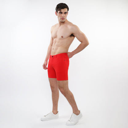 Bright red stretch knit shorts for men with a tailored fit, classic five-pocket design, and button closure