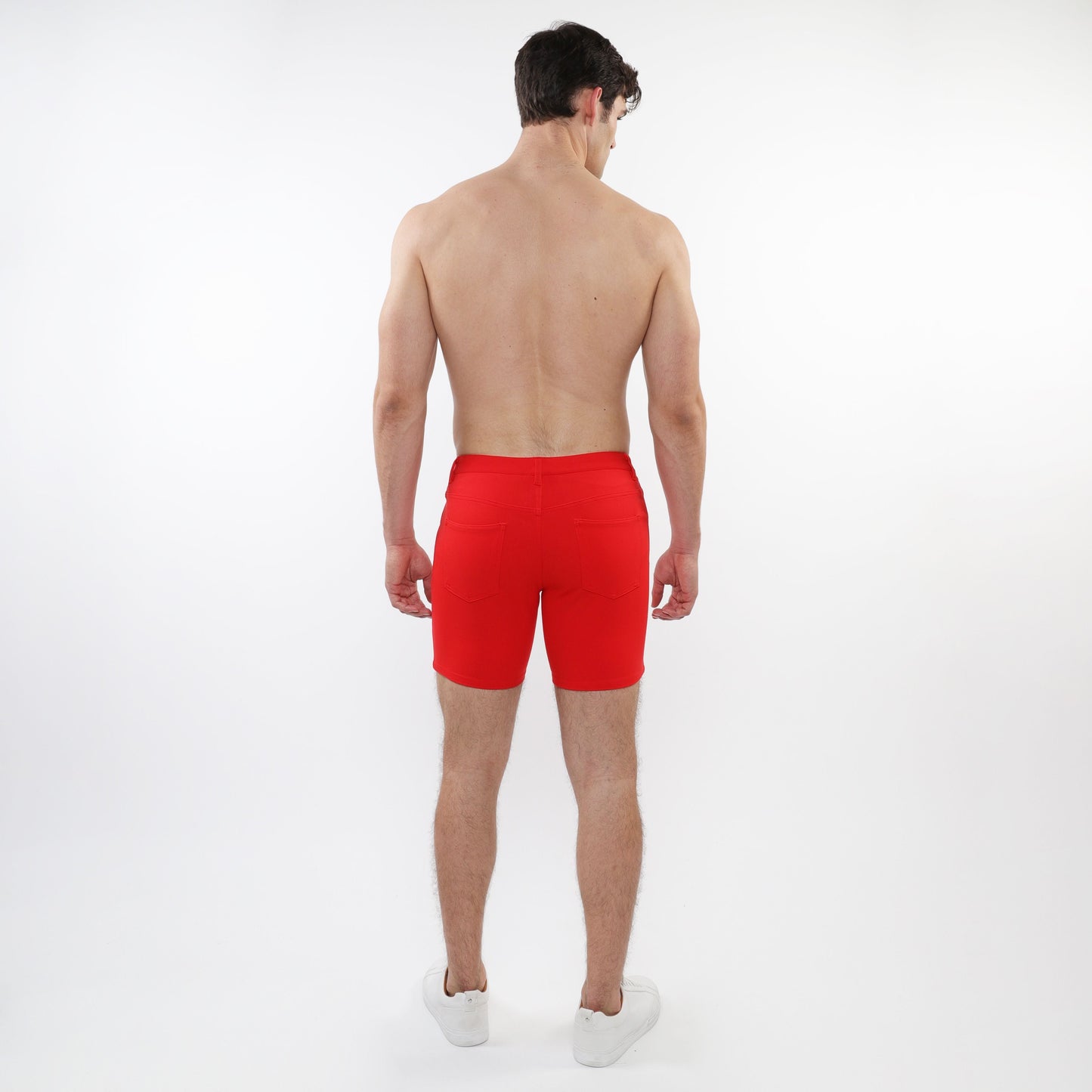 Red stretch knit short with snug fit elastic waistband made of stretchy knit fabric for athletic use