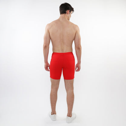 Red stretch knit short with snug fit elastic waistband made of stretchy knit fabric for athletic use