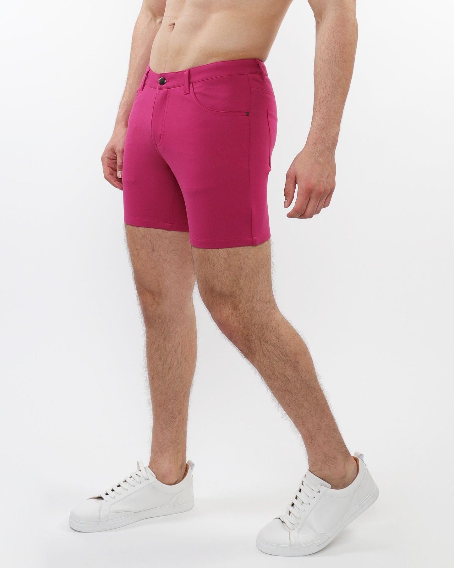 Fuchsia stretch knit short with form-fitting design and subtle stitching details for comfortable active wear