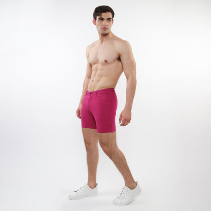 Vibrant fuchsia stretch knit shorts for men with sleek modern design and subtle stitching details