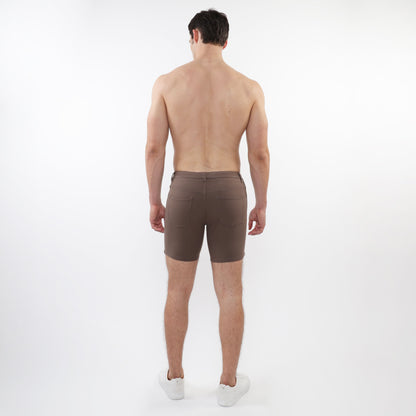 Brown stretch knit shorts with tailored fit and two back pockets shown from the back side