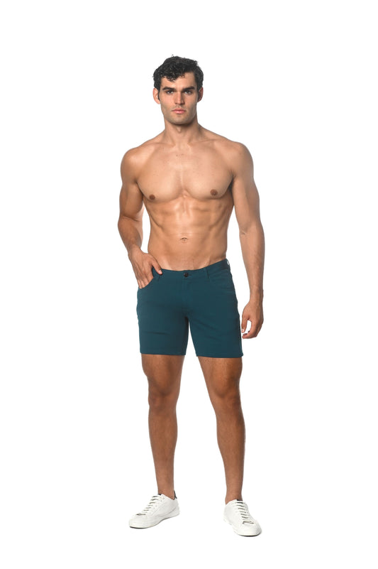 Teal stretch knit shorts with a sleek form-fitting design and subtle stitching details