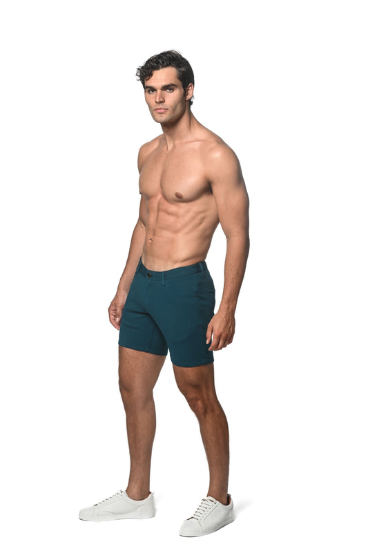 Teal stretch knit shorts with a tailored fit and sleek modern design perfect for casual and active wear