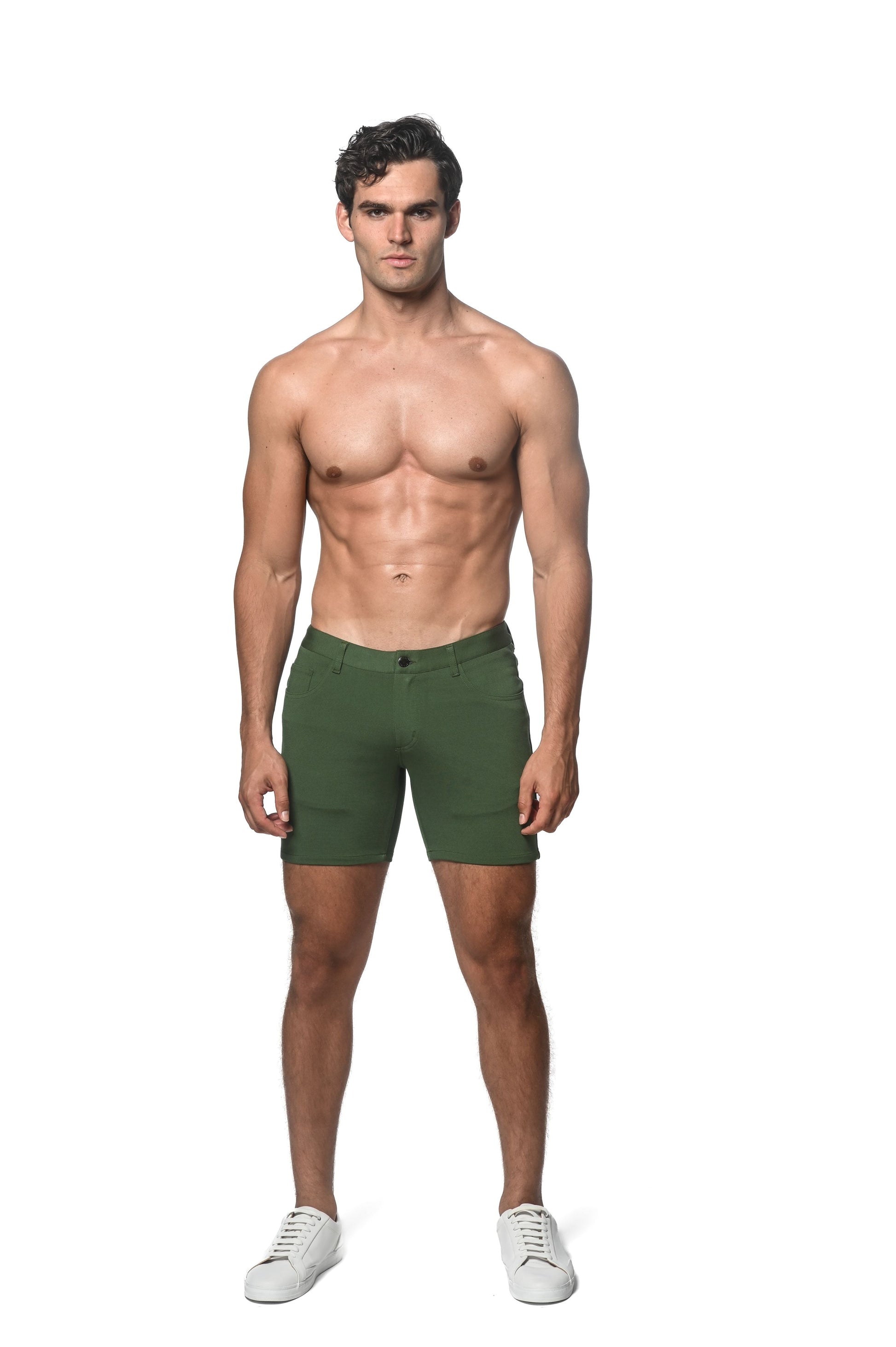 Olive green stretch knit slim-fit shorts with classic button closure and subtle side pockets
