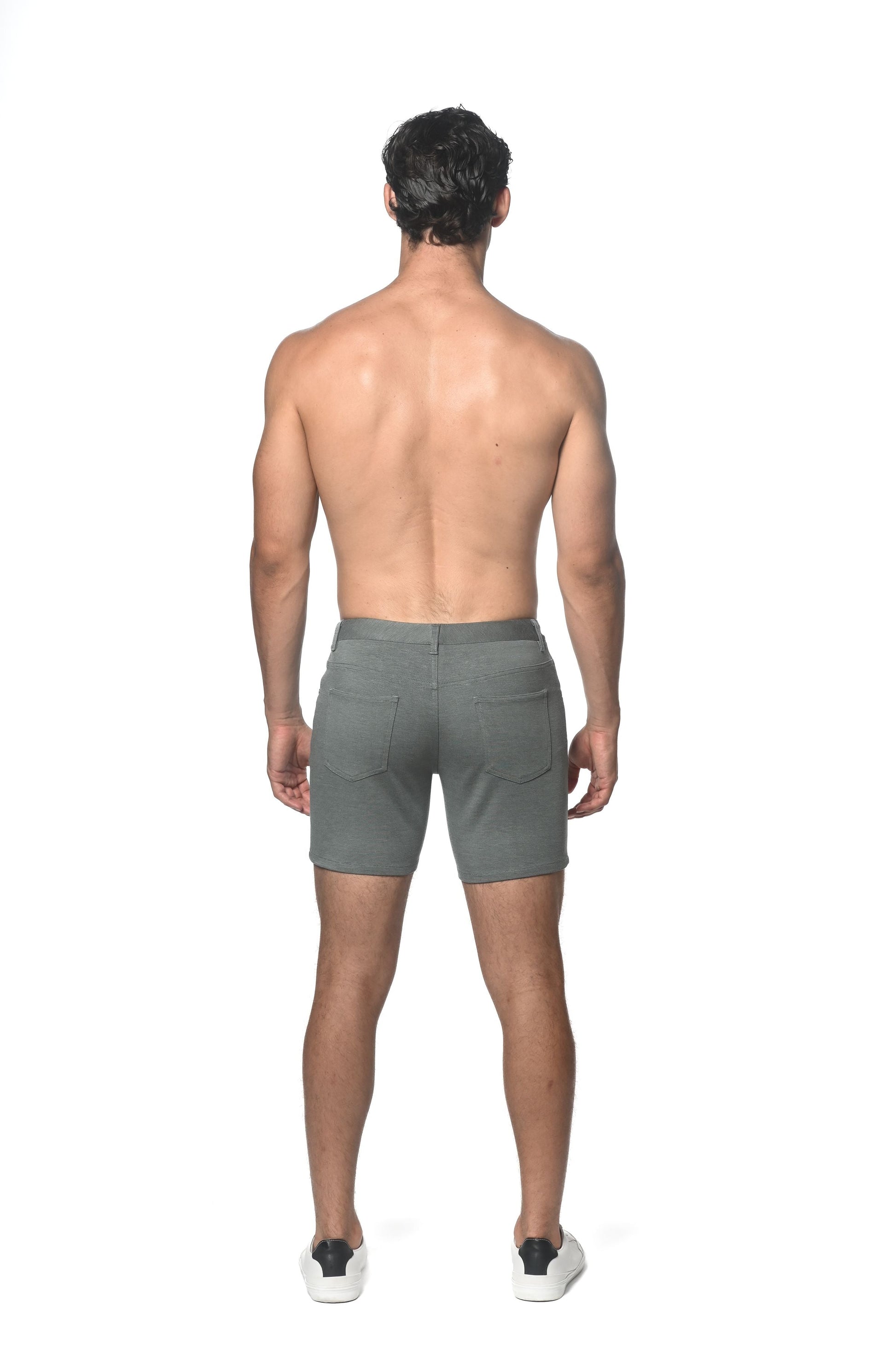 Gray stretch knit shorts with sleek modern design and subtle stitching details