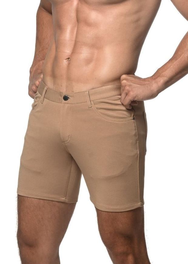 Beige stretch knit chino shorts with classic fit and black button closure for comfortable casual wear