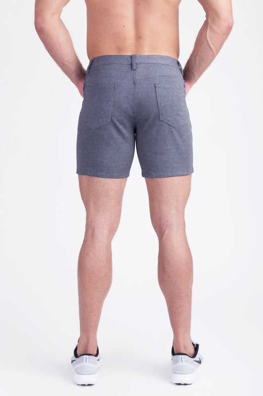 Gray heathered stretch knit shorts with classic five-pocket design and belt loop waistband in cotton fabric