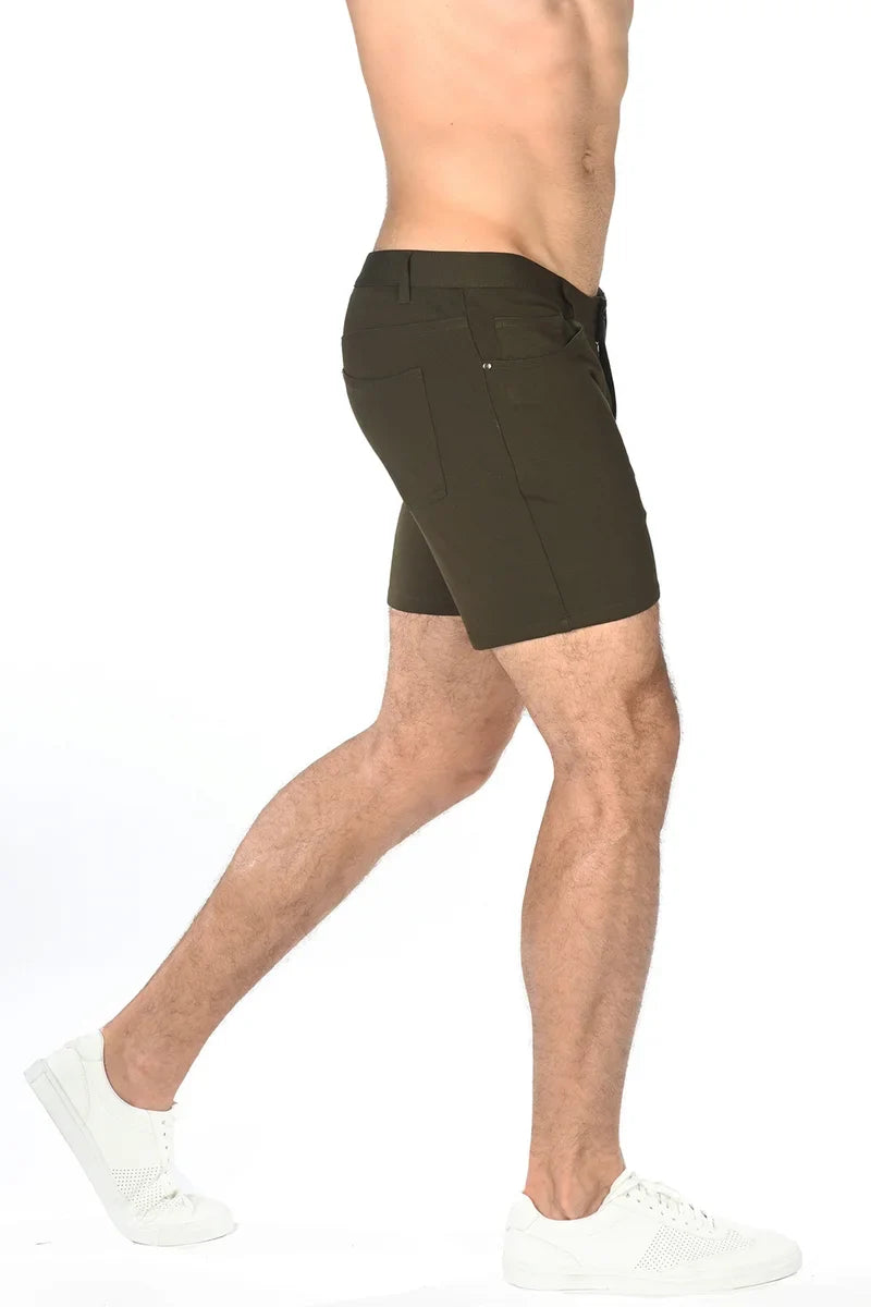 Dark olive green stretch knit chino shorts with tailored fit and subtle side pockets