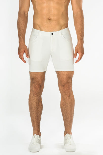 White stretch knit athletic shorts with sleek modern design and subtle stitching details