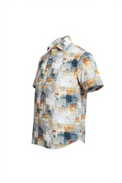 Suslo crinkled fabric short sleeved shirt with modern abstract blocks of muted orange navy blue and beige on light background
