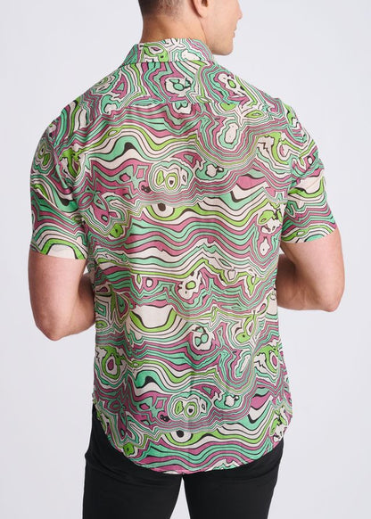 A vibrant short-sleeved lightweight cotton silk shirt with a psychedelic green pink and white swirling pattern