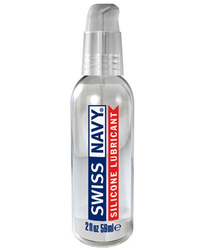 Clear glass bottle with silver pump dispenser containing swiss navy silicone lubricant in blue and red text label