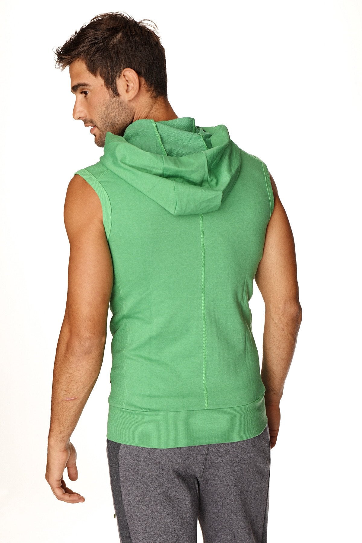 Green sleeveless yoga hoodie made of bamboo fabric featuring a hood and ribbed hem for comfortable wear