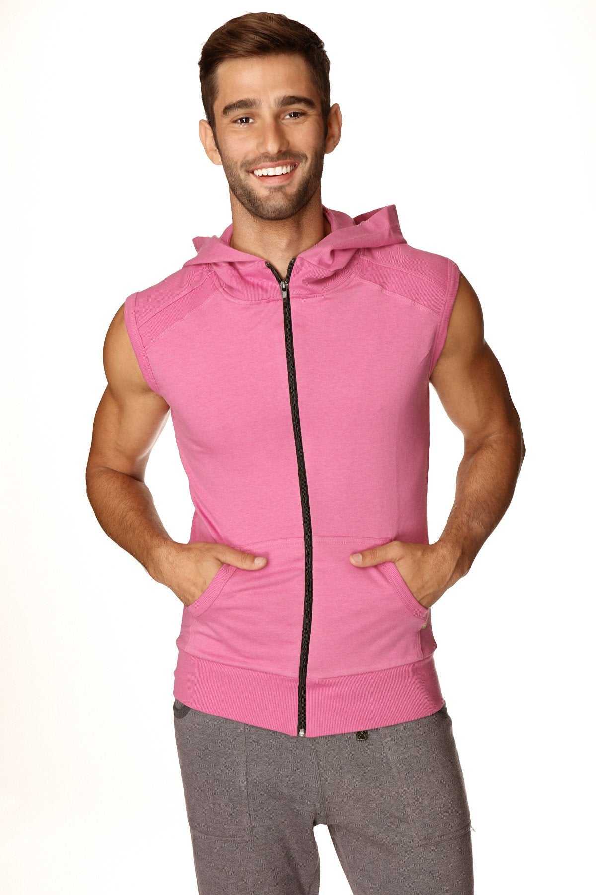Pink sleeveless zip up yoga hoodie with hood and front pockets designed for berry workout wear