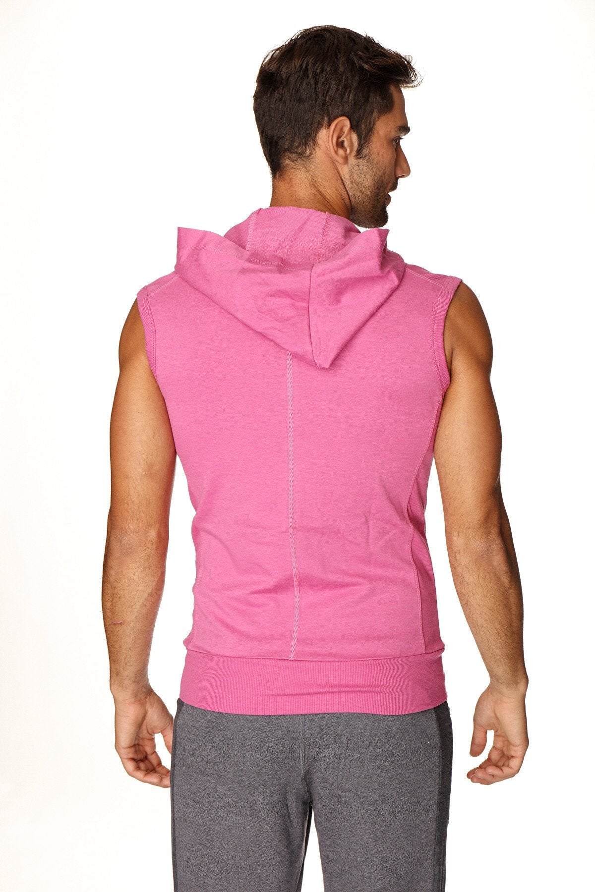 A vibrant berry sleeveless yoga hoodie with a hood and ribbed cuffs designed for comfortable workouts