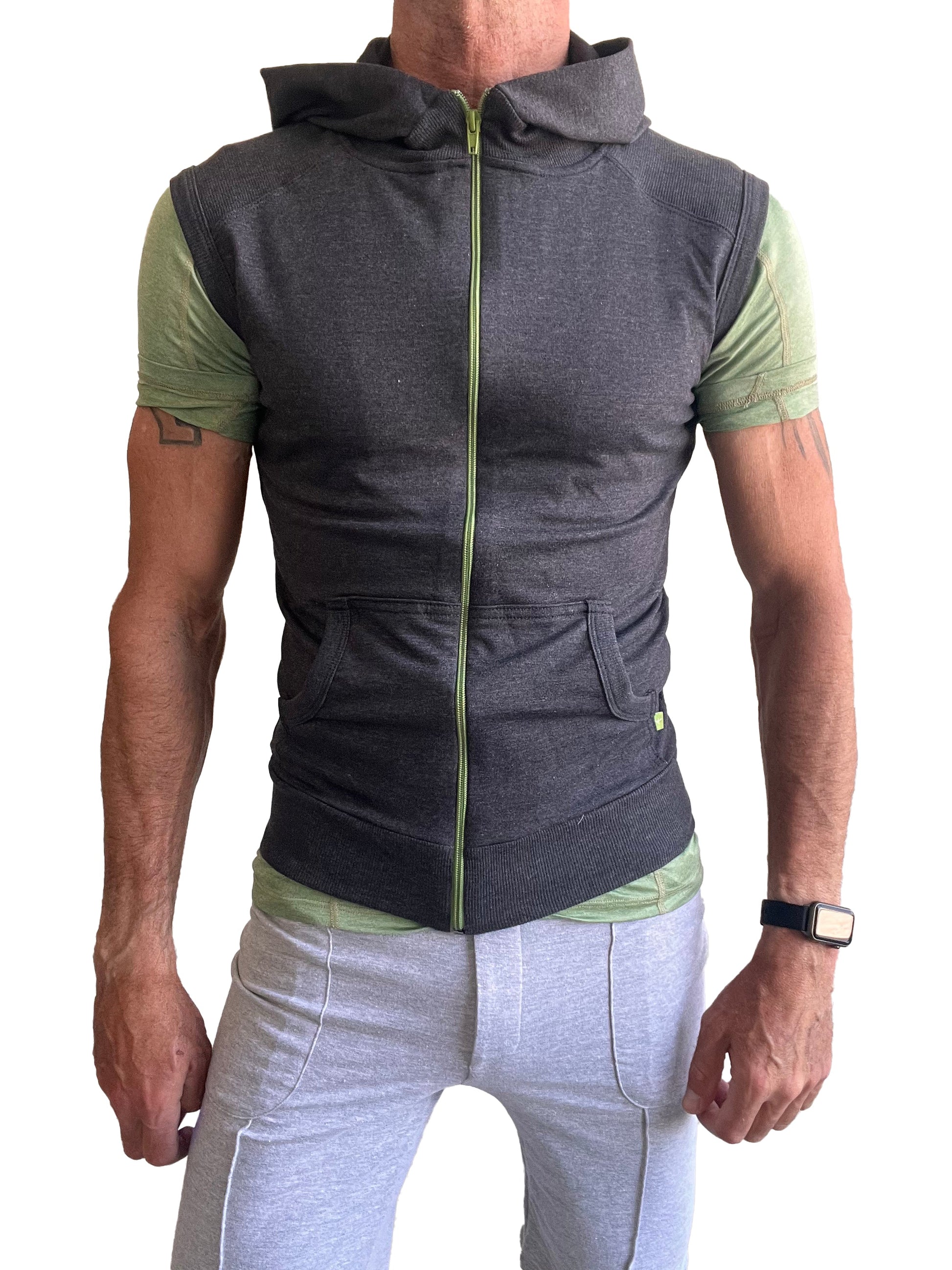 Sleeveless yoga hoodie charcoal gray in dark gray with lime green zipper and sleeve accents worn over matching shirt