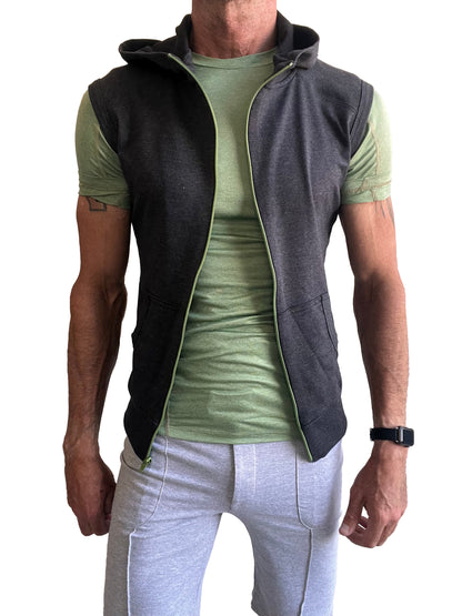 Sleeveless yoga hoodie charcoal gray with dark gray hooded vest featuring light green zipper and inner lining over olive t-shirt