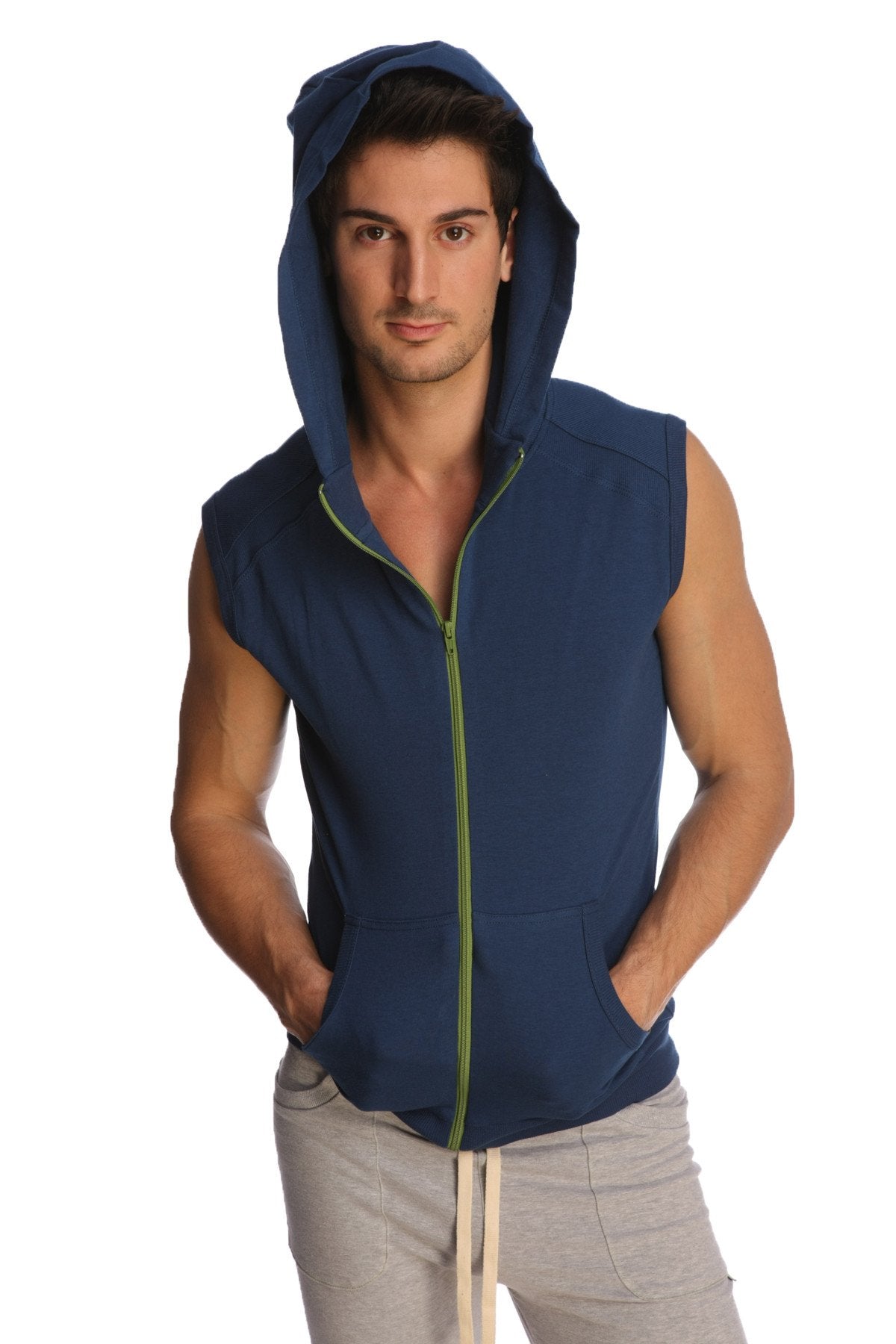 Sleeveless yoga hoodie in navy blue with lime green zipper and front pockets designed for comfort and mobility