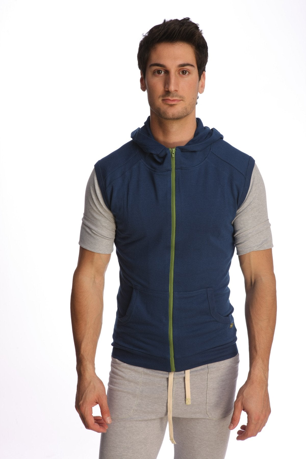 Navy blue and gray sleeveless yoga hoodie vest with lime green zipper trim designed for comfortable active wear