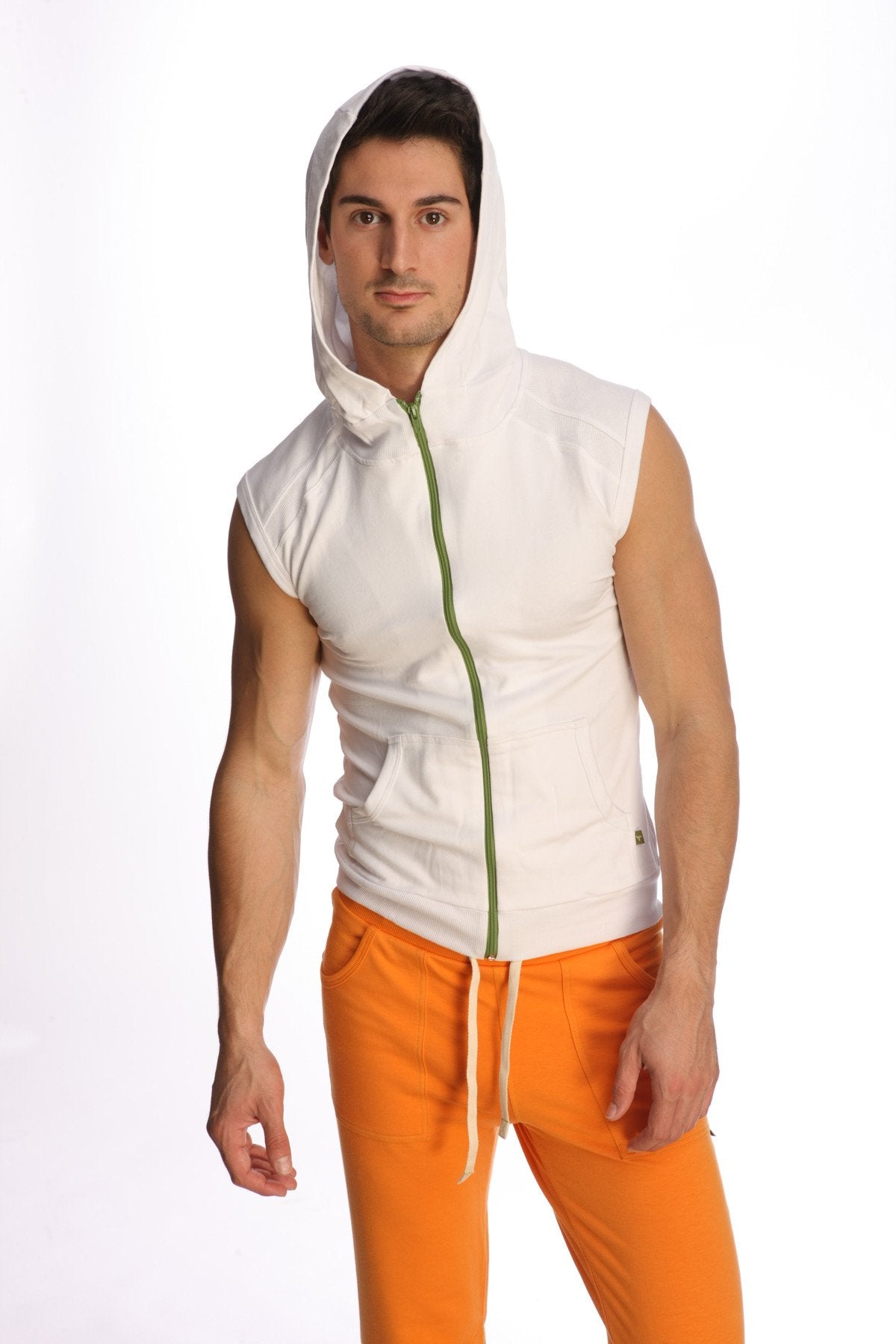 White sleeveless yoga hoodie with green zipper and drawstring hood designed for comfortable activewear