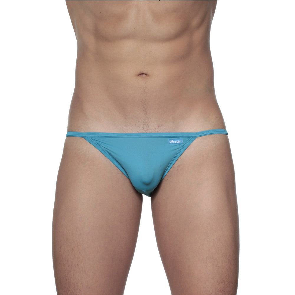 Teal-colored slim-fitting thong bikini with a subtle brand logo on the waistband groovin string bikini cyan blue st0111