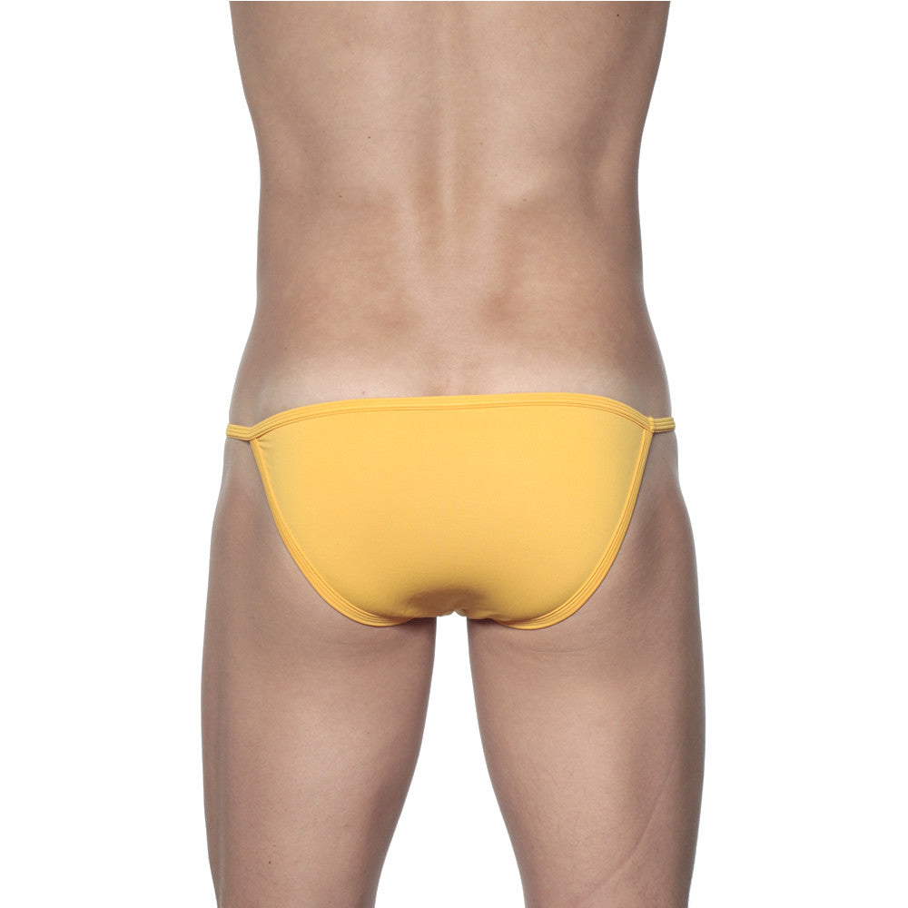Yellow thong briefs groovin string bikini golden yellow st0104 made of soft breathable fabric shown from the front