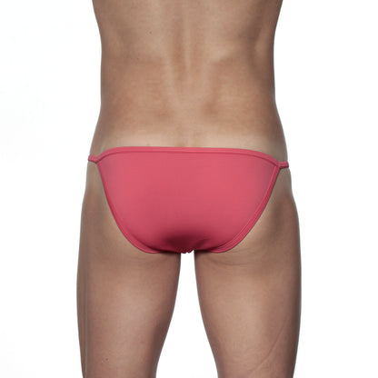 Groovin string bikini rouge red coral pink swim trunks with smooth fabric and thin side ties front view