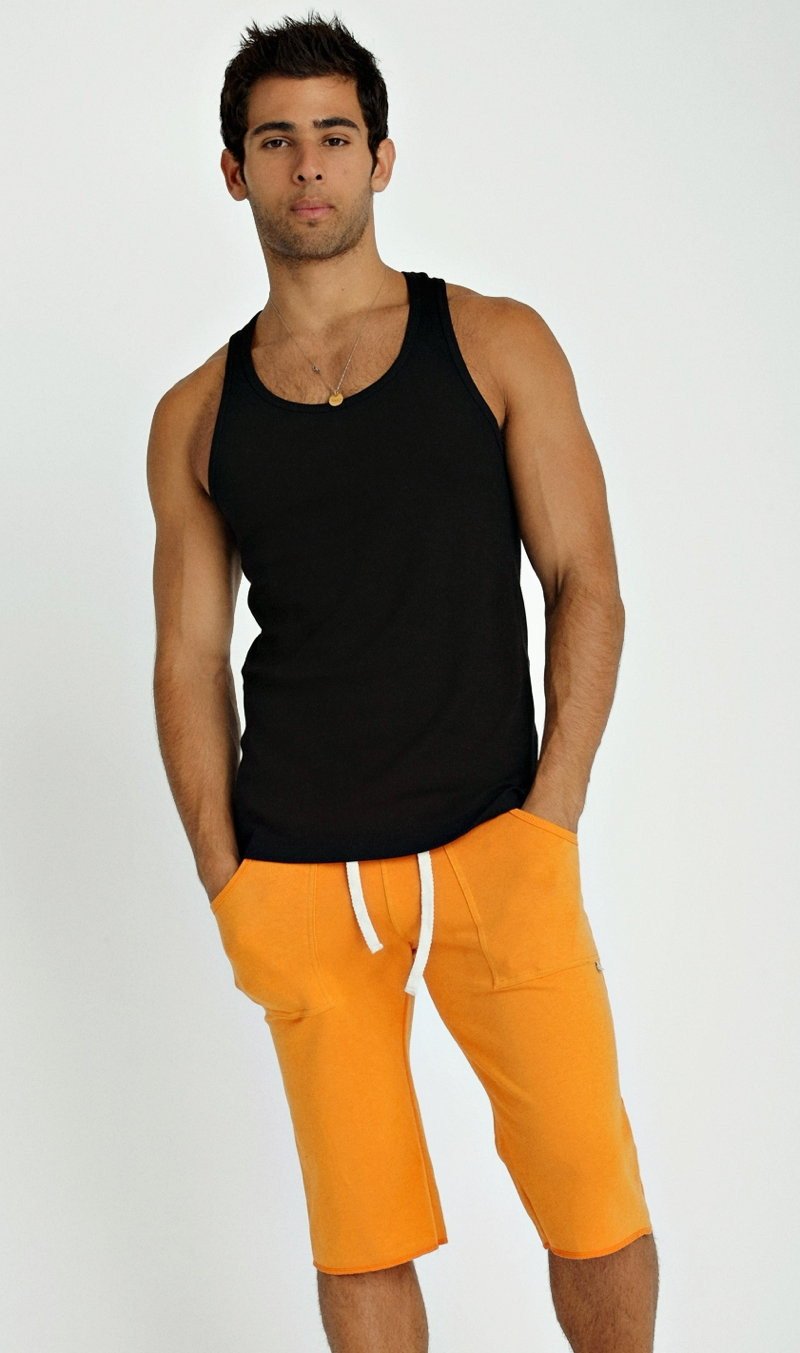 Black sleeveless sustain tank top with rounded neckline and ribbed hemline made from sustainable fabric