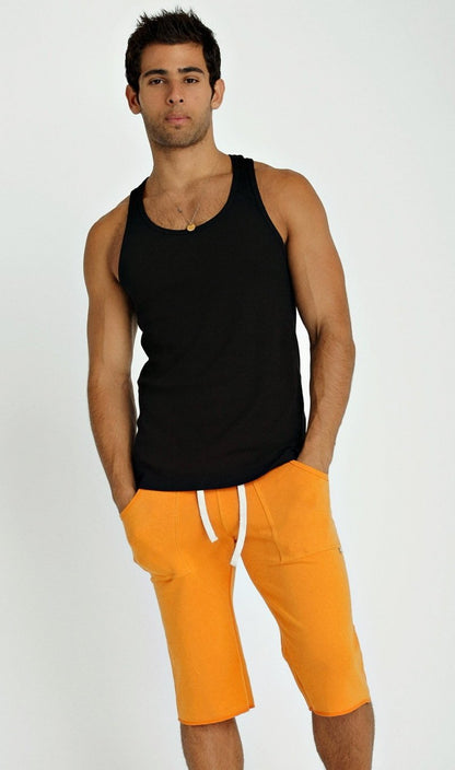 Black sleeveless sustain tank top with rounded neckline and ribbed hemline made from sustainable fabric