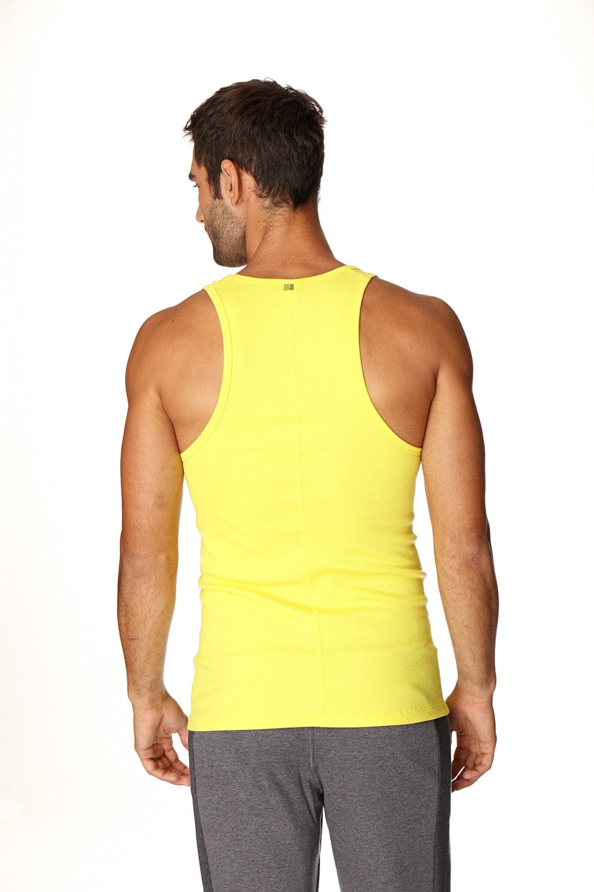 Bright yellow sleeveless Sustain tank top made from sustainable fabric designed for athletic performance