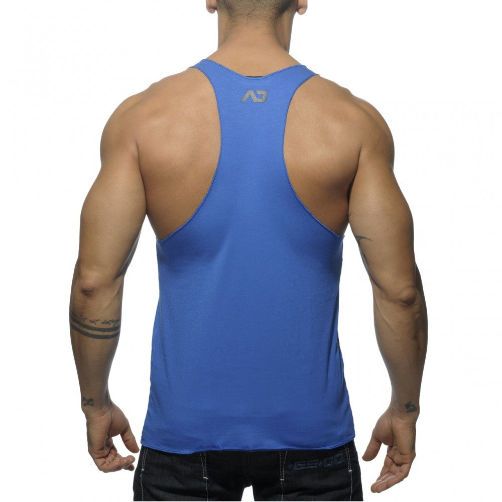 Blue athletic tank top with subtle gray logo on the upper back shown from the back side in tank back printed style