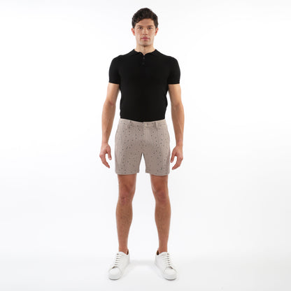 Beige textured jacquard stretch chino shorts with subtle black dot pattern button fly and belt loops