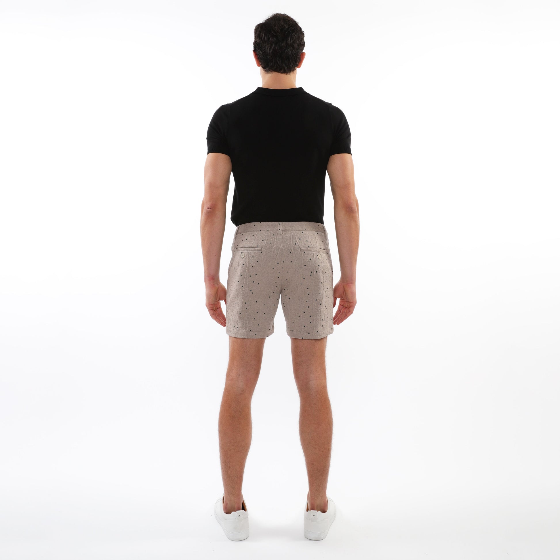 Beige textured jacquard stretch chino shorts with subtle black dot pattern classic tailored fit and two front pockets