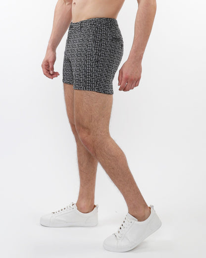 Black and gray geometric-patterned men’s boxer briefs with snug fit made from textured jaquard stretch knit fabric