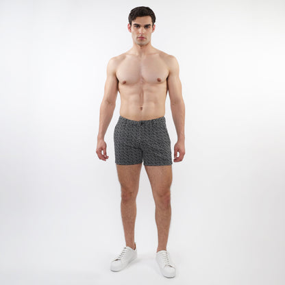 Textured jacquard stretch knit chino shorts with zip pockets in black and white geometric pattern for men
