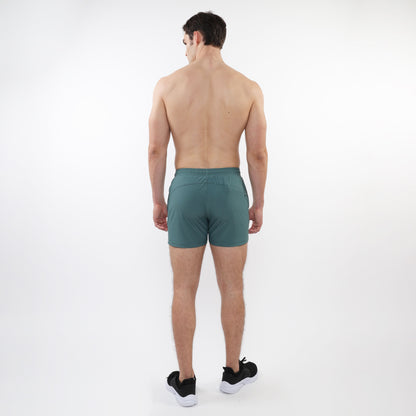 Teal textured mesh stretch performance shorts with a sleek modern design and elastic waistband