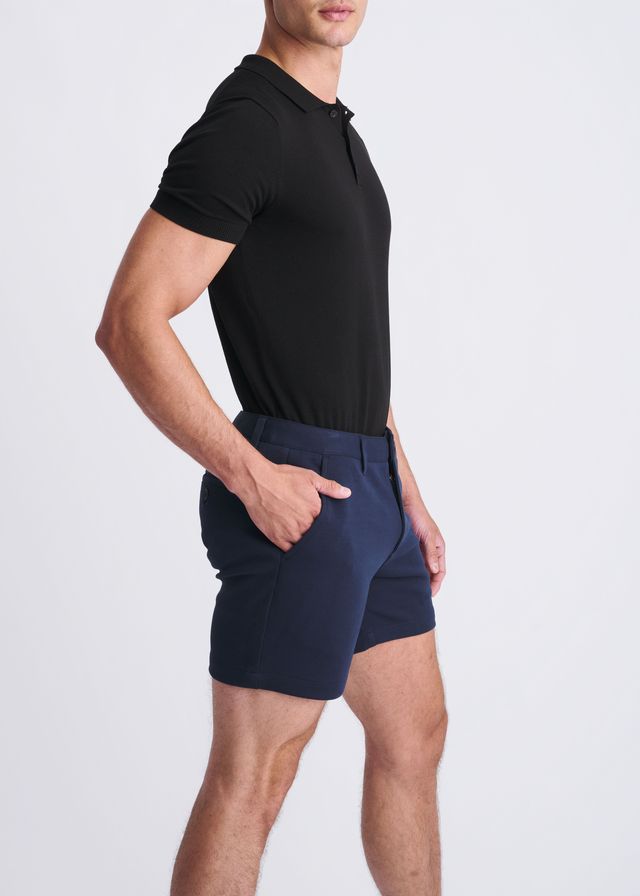 Navy blue tailored textured stretch knit chino shorts with a modern cut and subtle side pockets