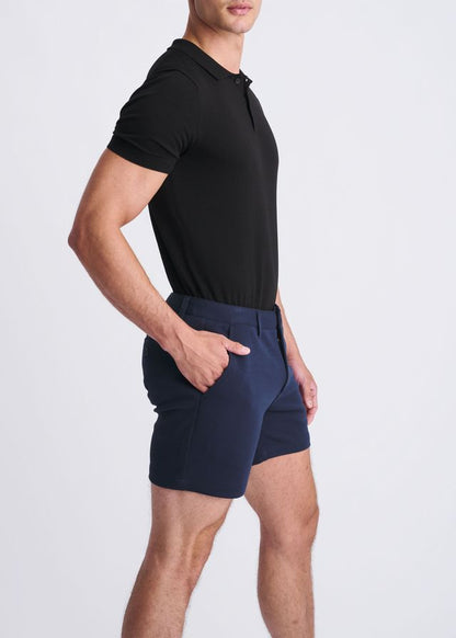 Navy blue tailored textured stretch knit chino shorts with a modern cut and subtle side pockets