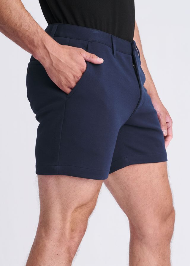 Navy blue textured stretch knit chino shorts with tailored fit and subtle side seam detailing for modern style