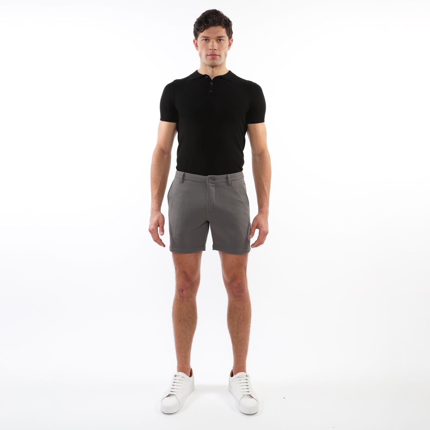 Gray textured stretch knit chino shorts with a subtle weave and classic tapered fit for casual wear