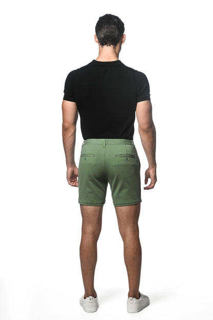 Back view of olive green textured stretch knit chino shorts with two button closure back pockets