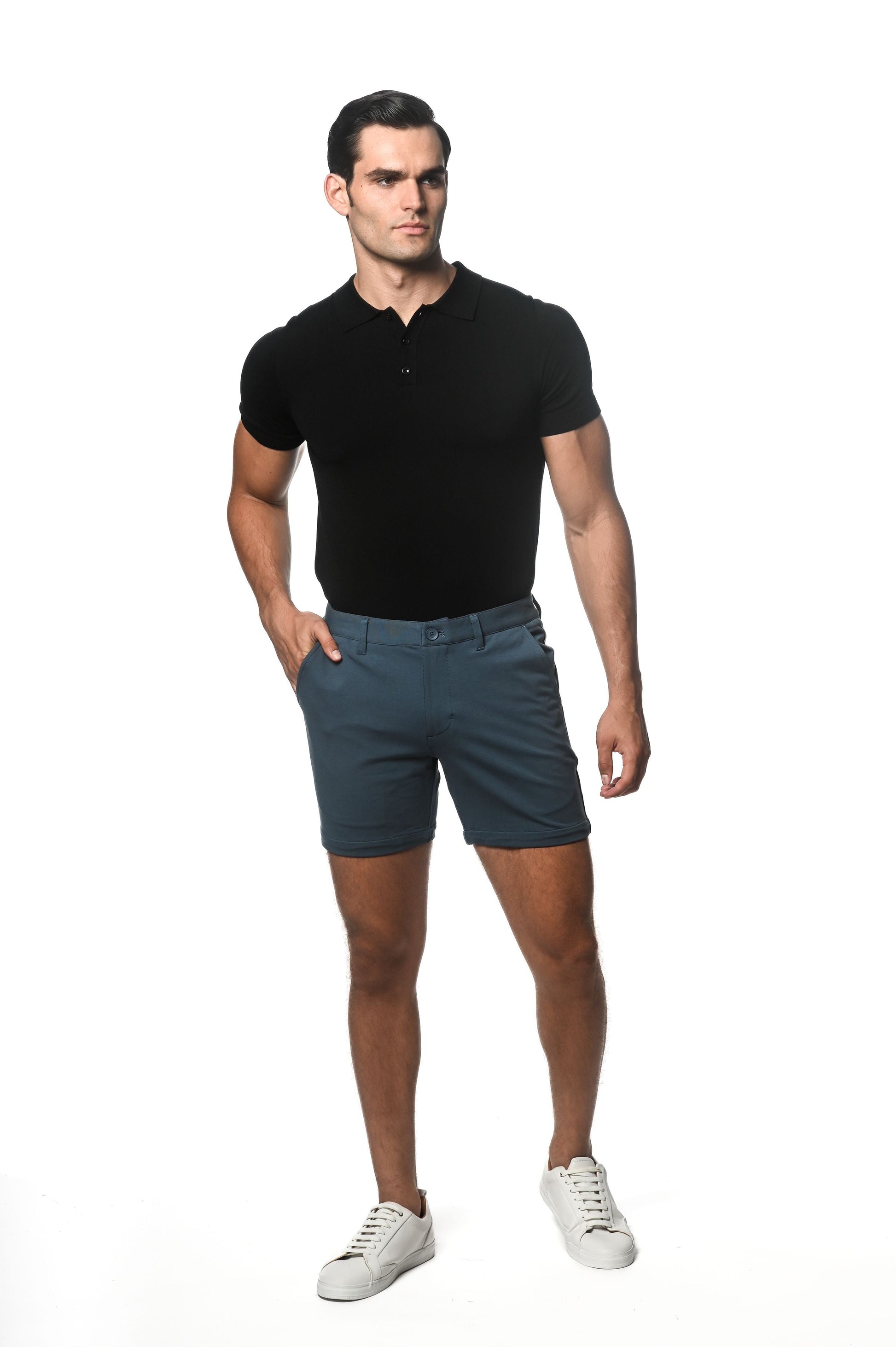 A pair of dark teal textured stretch knit chino shorts with classic fit and belt loops