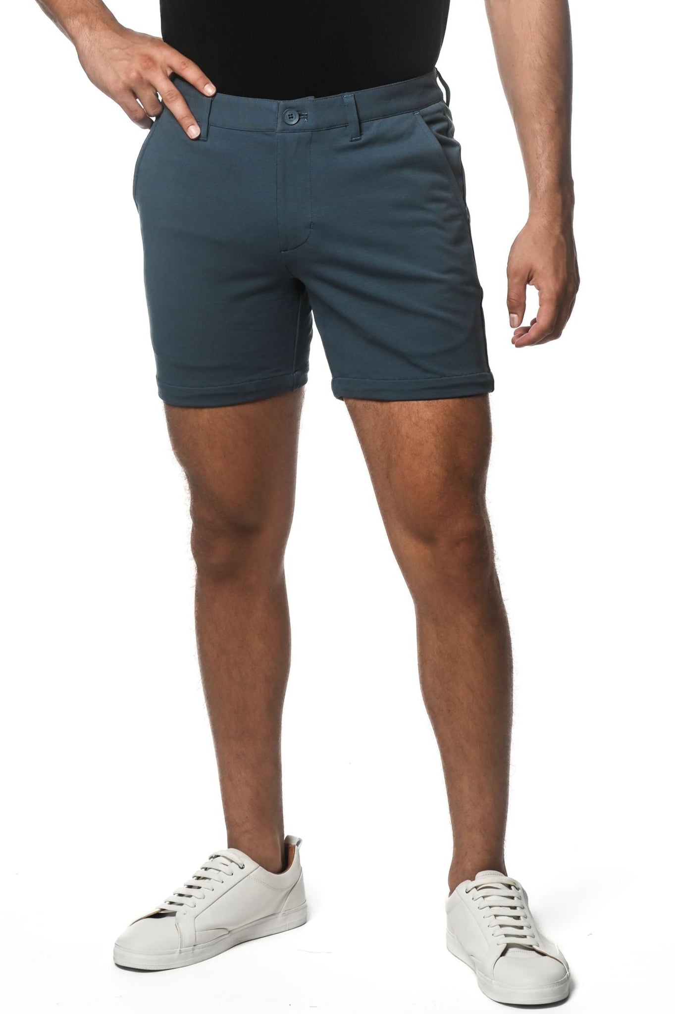 Dark teal textured stretch knit chino shorts with classic fit and button closure for comfortable casual wear