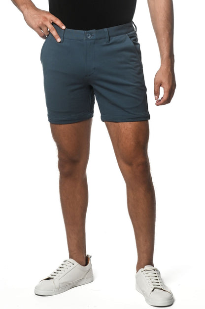 Dark teal textured stretch knit chino shorts with classic fit and button closure for comfortable casual wear