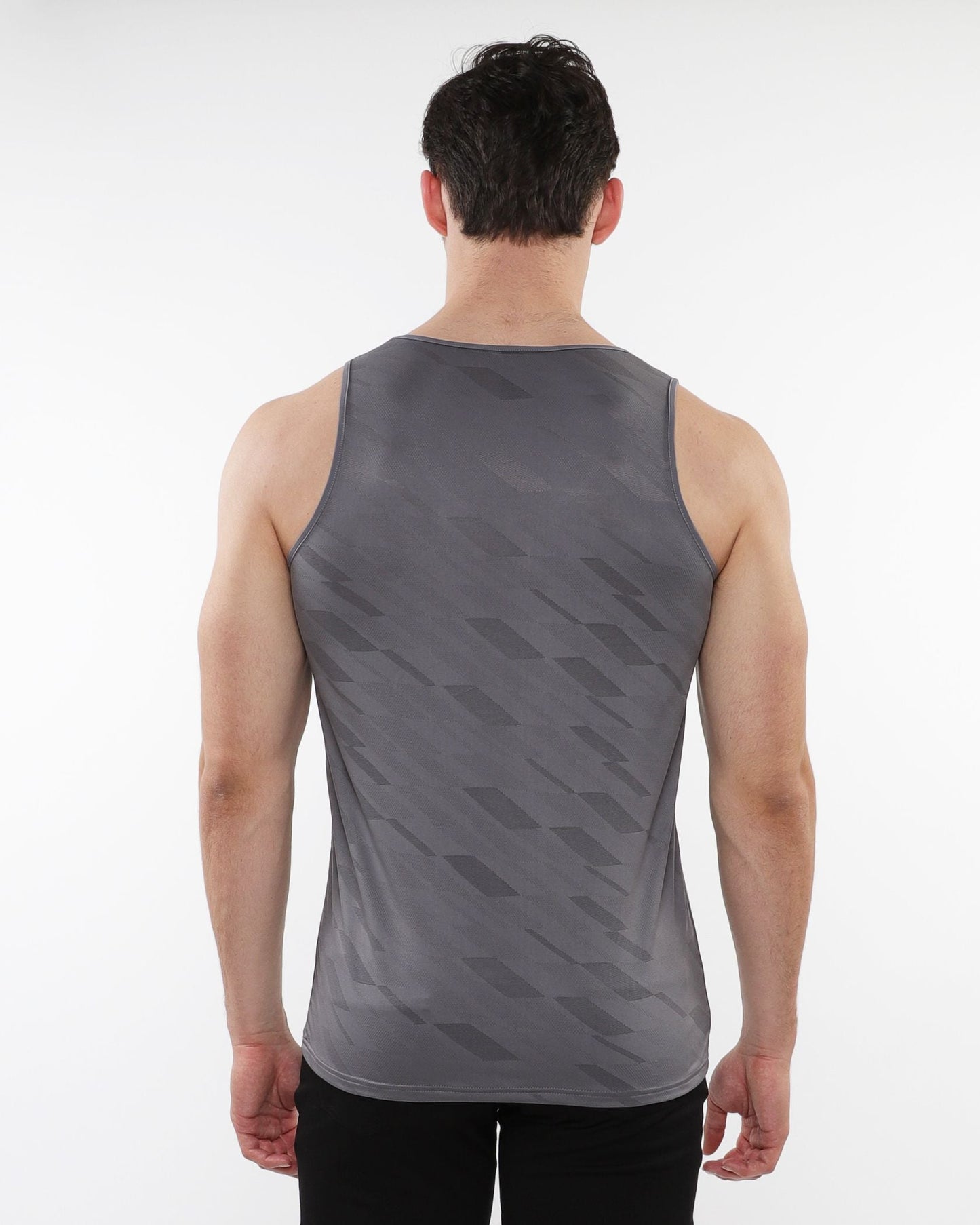 Gray athletic tank top with subtle geometric pattern made of textured stretch mesh for performance use