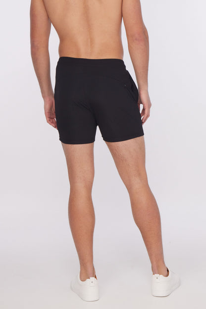 Black textured stretch performance athletic shorts with a sleek modern design and subtle side pockets for active use